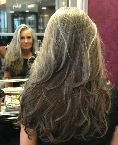 Long-Layered Dark Ash Blonde Hairstyle
