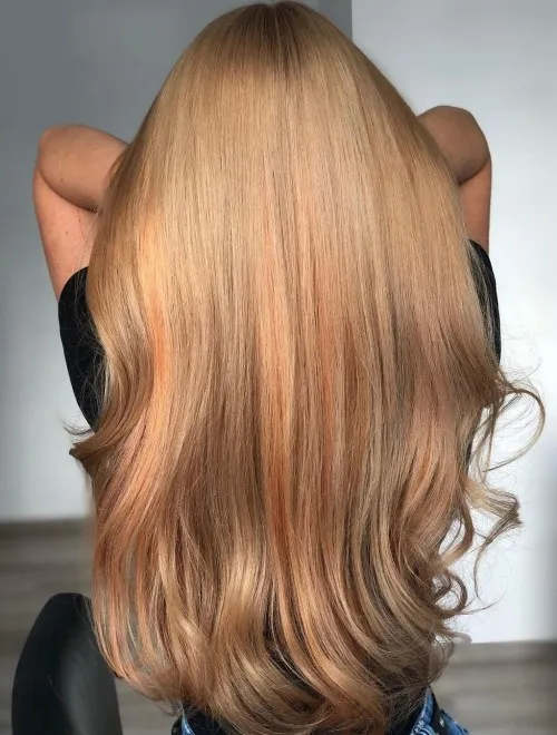 27. Honey Blonde with Copper Undertones