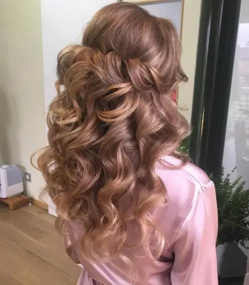 30. Curly Half Down Tresses