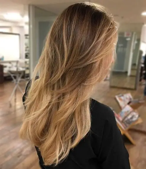 10. Subtly Layered Mid-Back Tresses