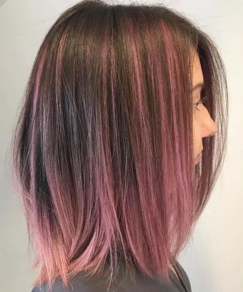 21. Straight Brown Hair with Pink Highlights