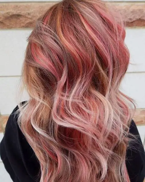 28. Blonde Hair with Reddish Pink Highlights