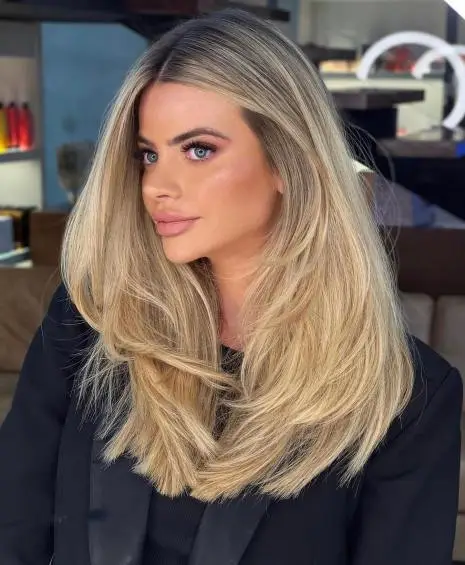 32. Long Flowy Middle-Parted Style
