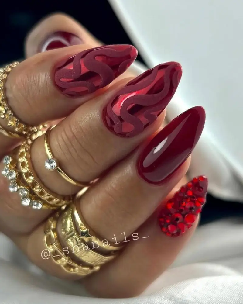 12. Red nails with design