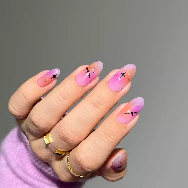 20. Purple Aura Bat Nails