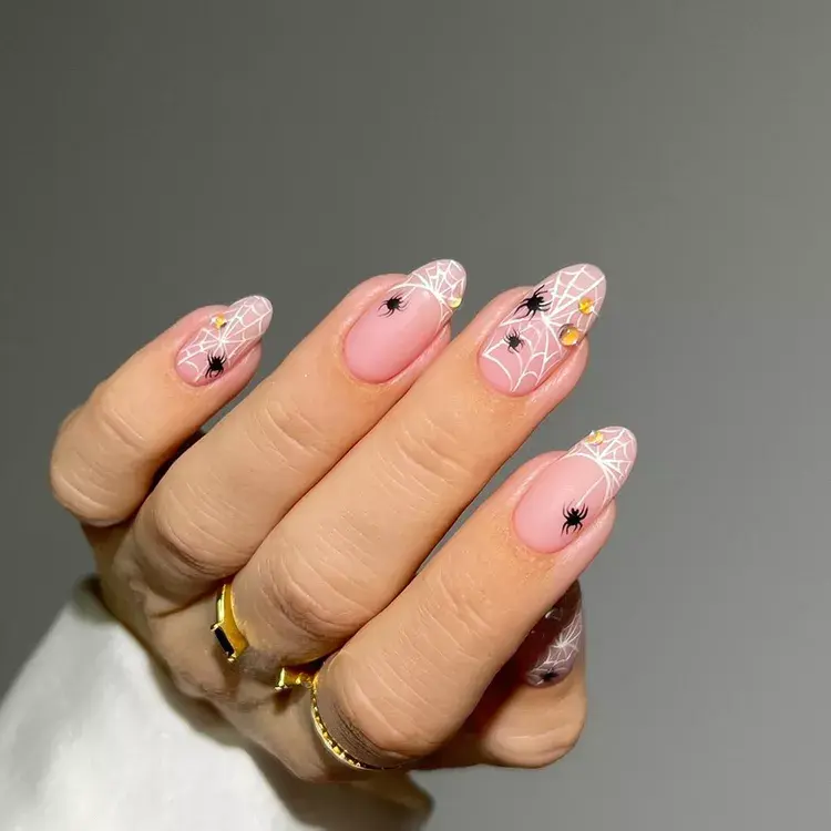 30. White Web Nails
