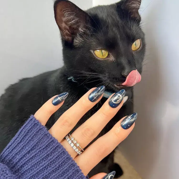31. Celestial Cat-Eye Nails