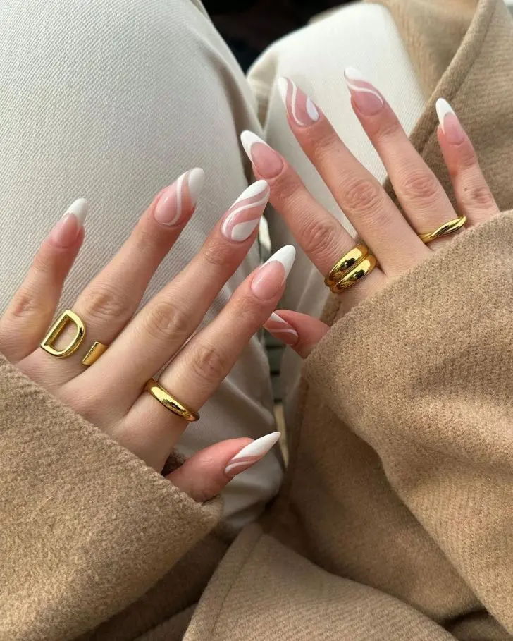 32. White Swirl French Tip Fall Nail Design