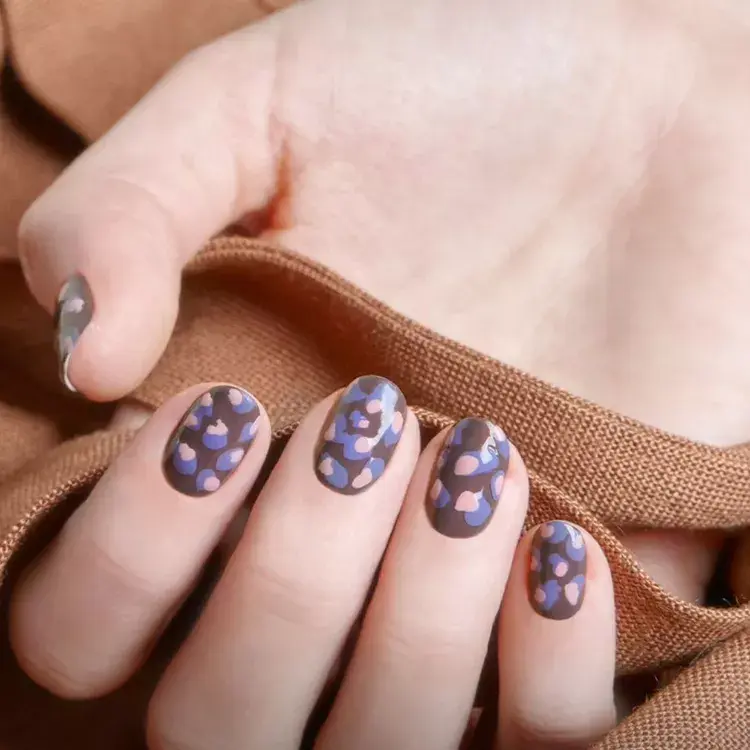 6. Cool-Tone Animal Print Nails