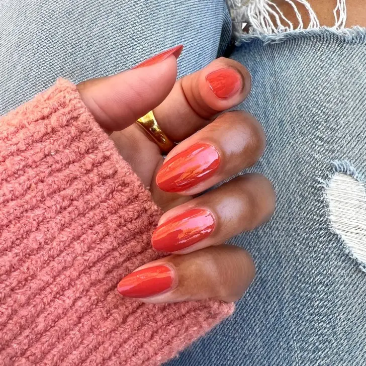 8. Simple + Spicy Pumpkin Orange Fall Nail Inspo