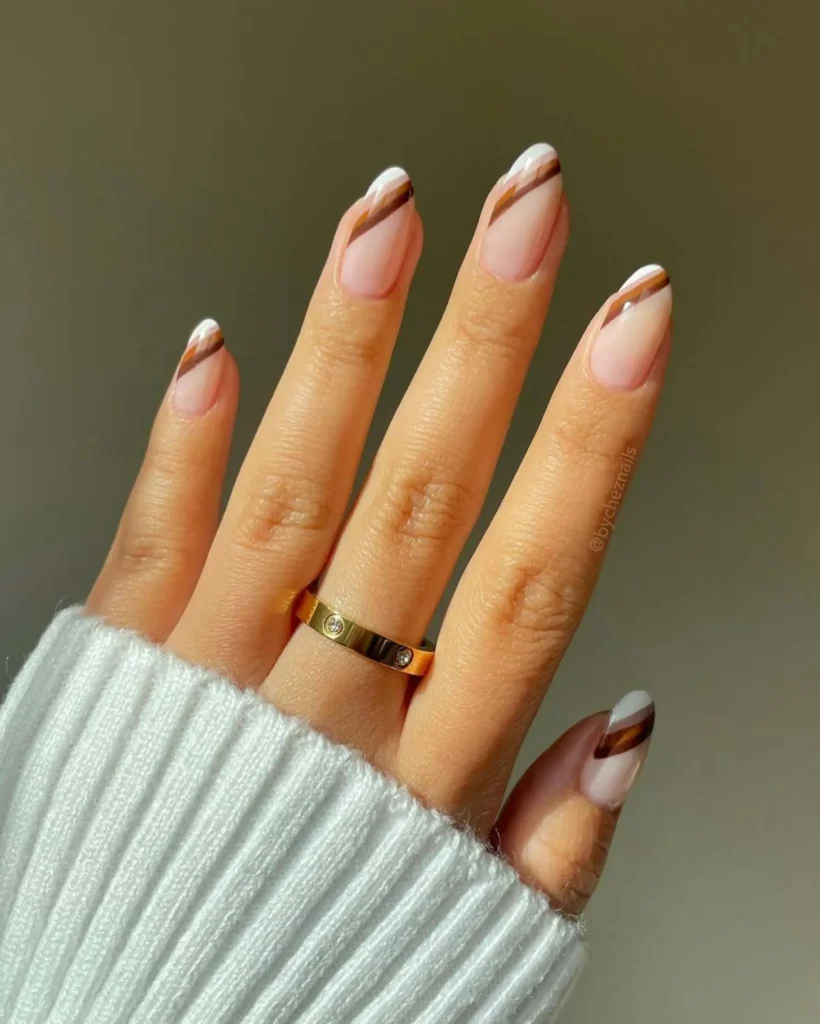 11. Asymmetrical Brown Gradient French Manicure