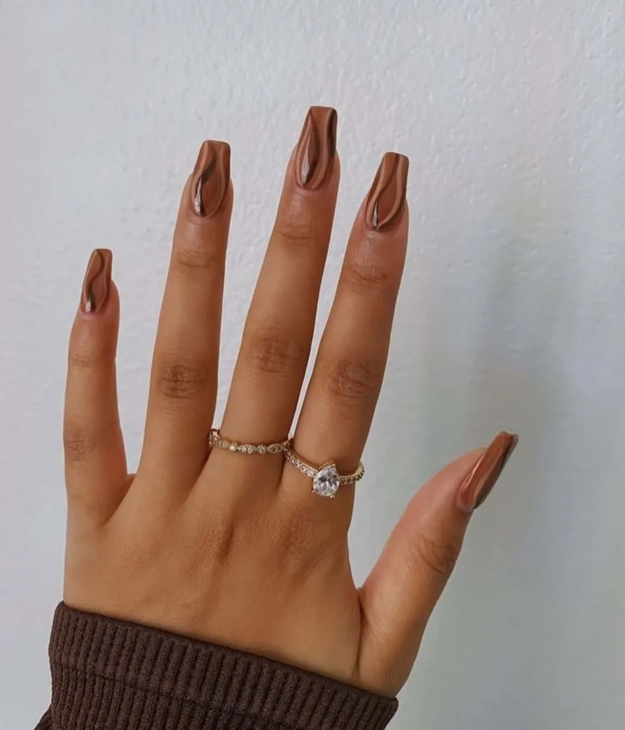 16. Trendy Coffee Swirl Manicure