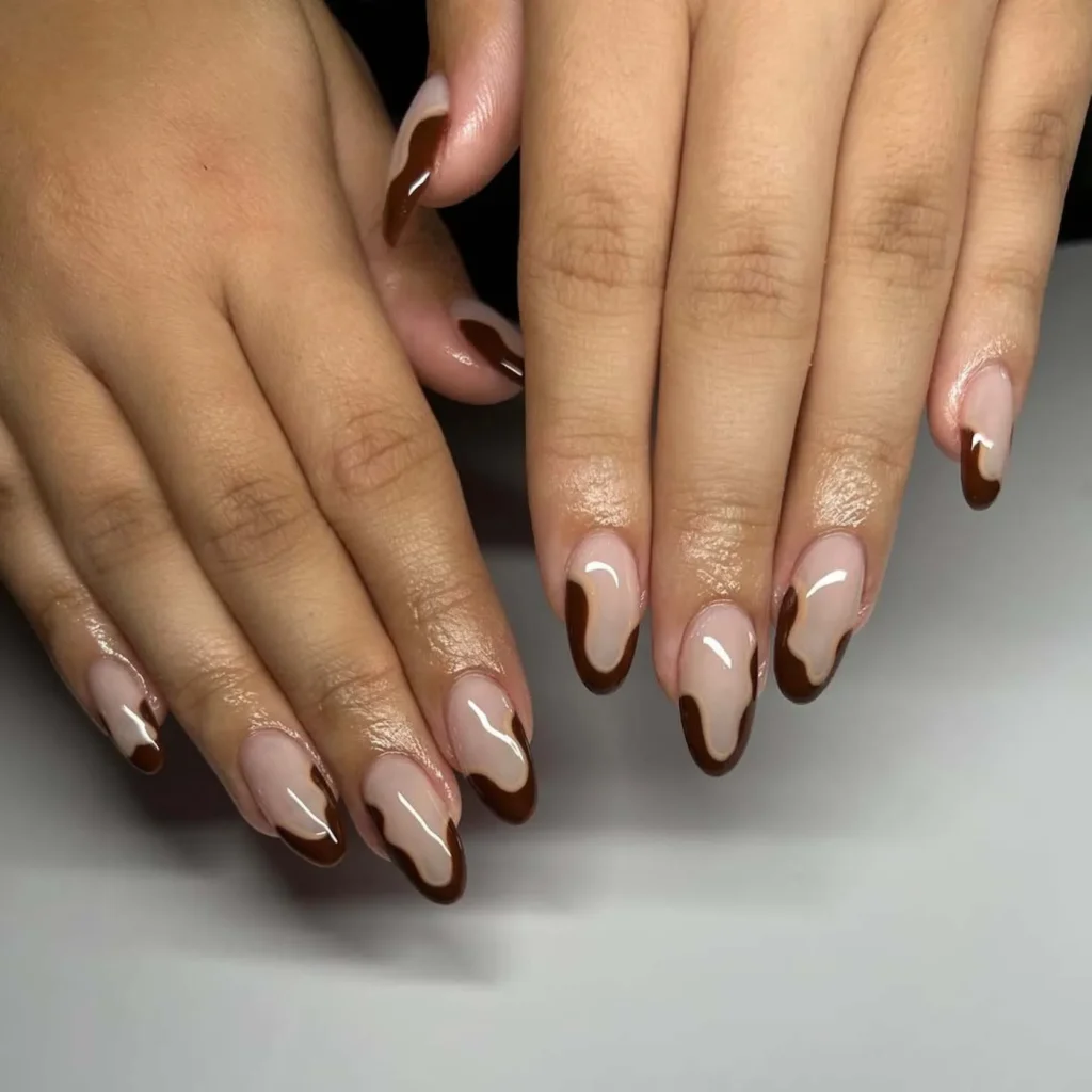 23. Groovy Brown Swirl French Tip Nails