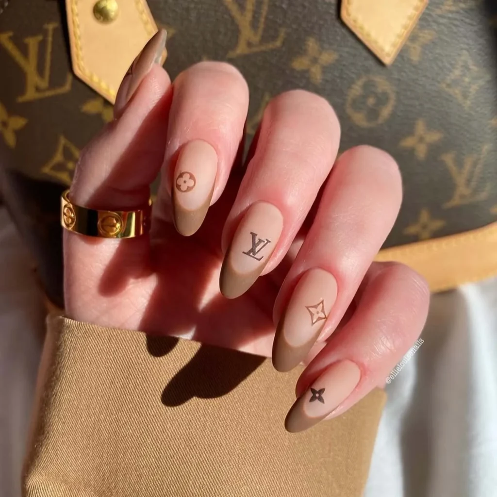 35. Chic Designer Brown Manicure