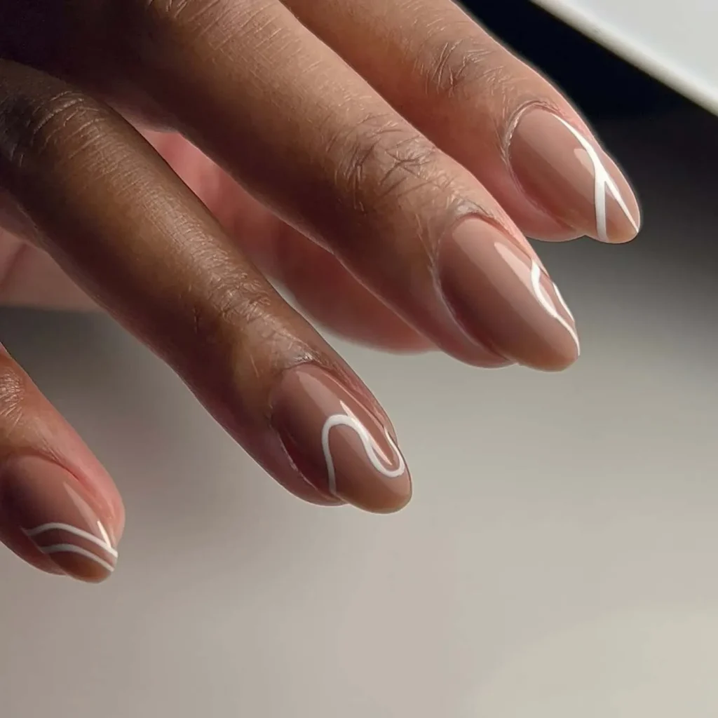 37. Dreamy Swirl Mocha Mousse Nails