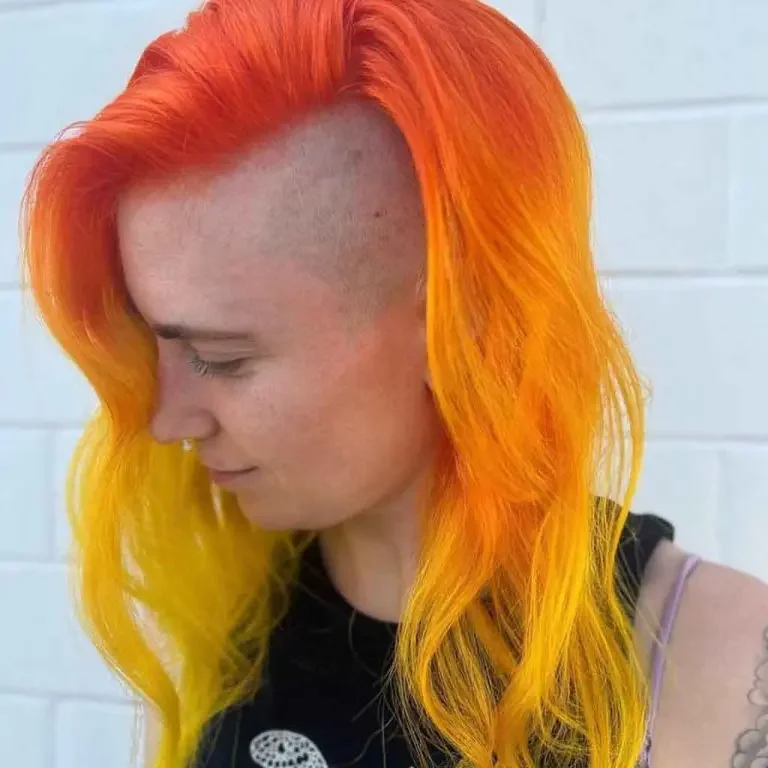 Half Shaved Buzz Cut With Medium Fire Hair Color Female Side Shaved Hairstyles