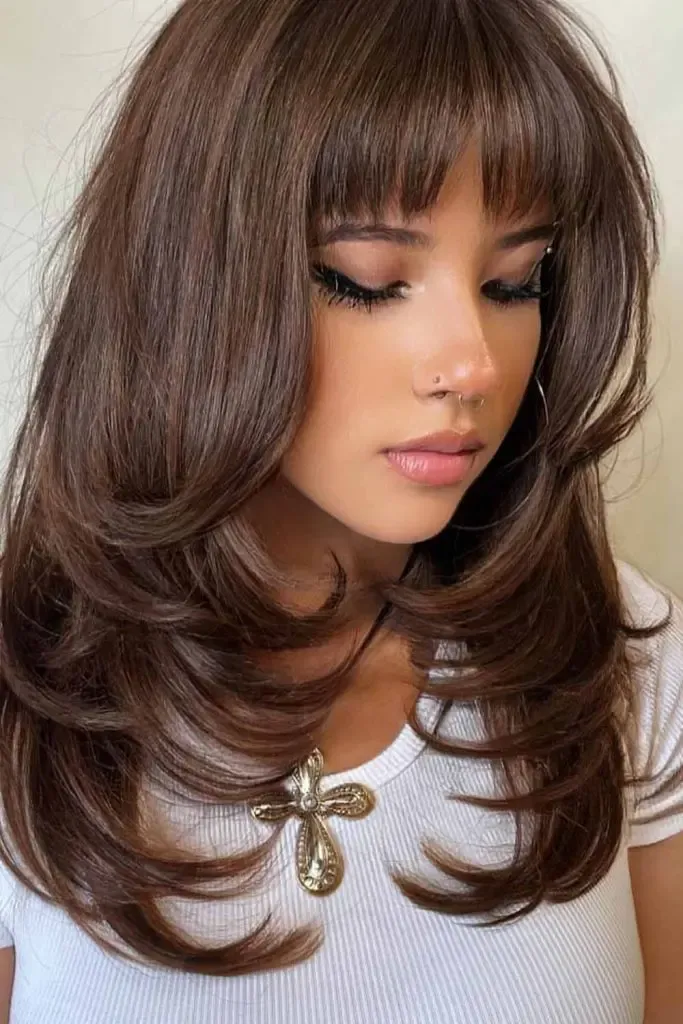 Medium Brunette Balayage Hair with Butterfly Cut and Bangs