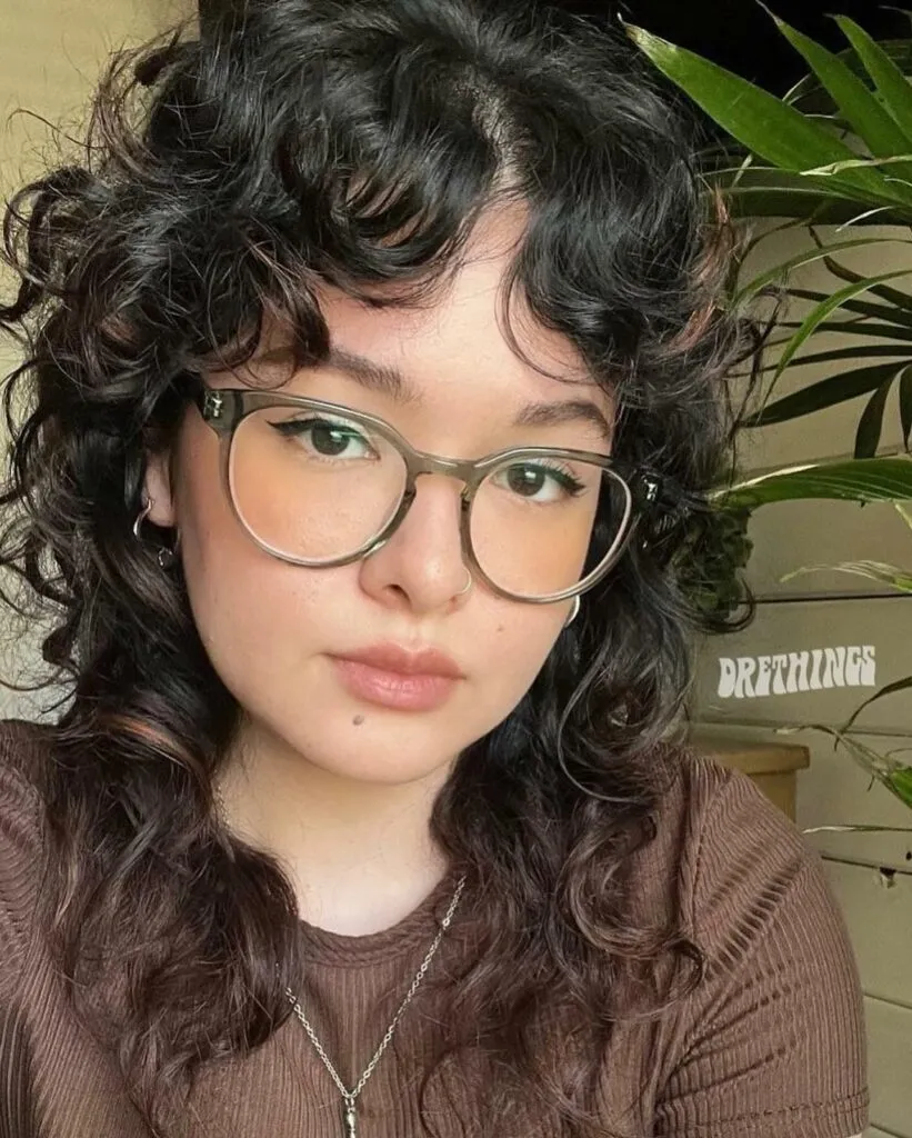 Short Butterfly Cut On Curly Hair