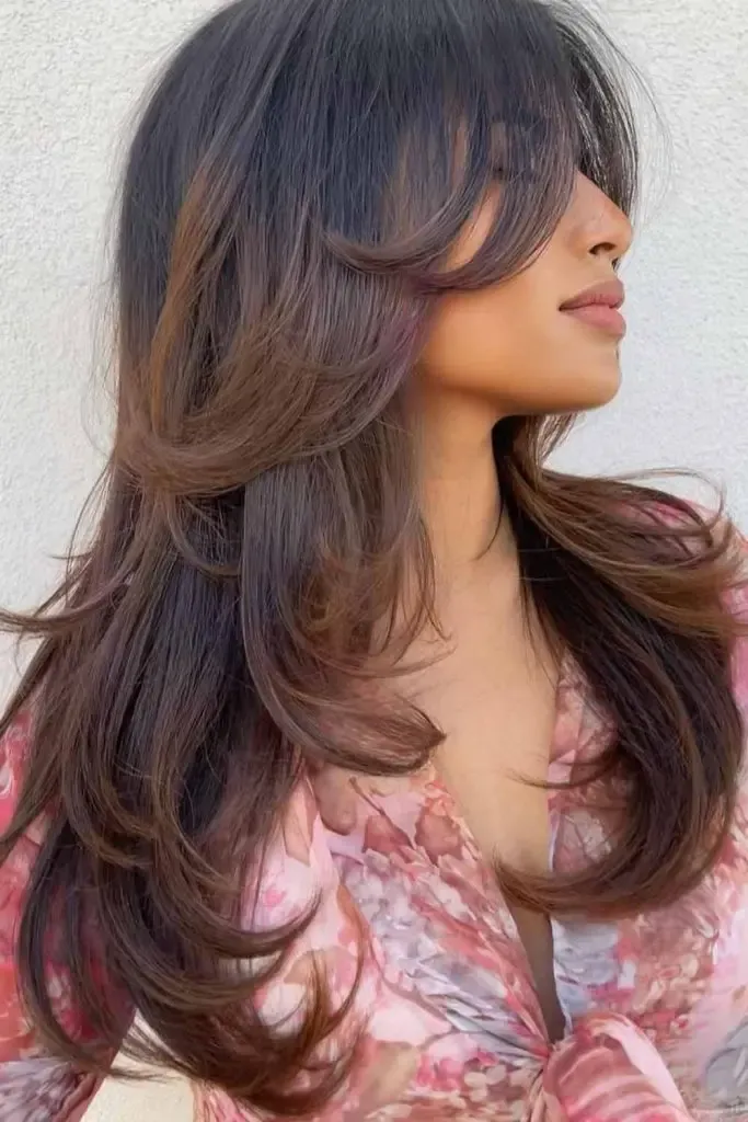 Layered Long Hair with Loads of Layers and Curtain Bangs