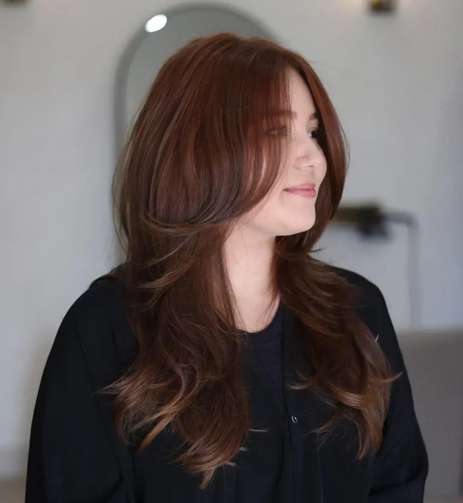 Haircut with Bangs and Shaggy Waves