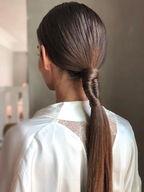 Low Ponytail with a Braided Detail