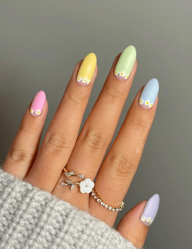 Pastel Skittle Spring Nails With Cute Daisy Designs