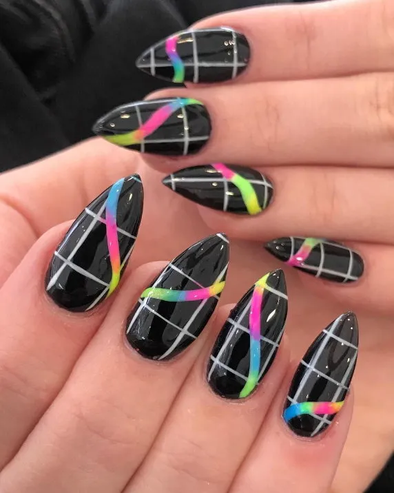 Black nails with neon stripe nail design