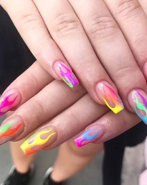 Long acrylic nails with neon flame designs