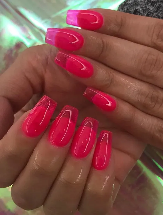 Long neon pink jelly coffin nails