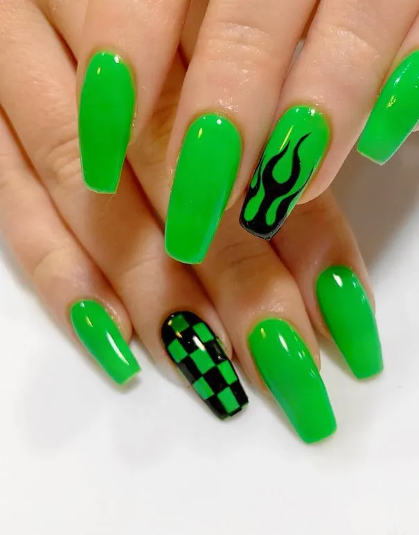 Neon green coffin nails with flame designs