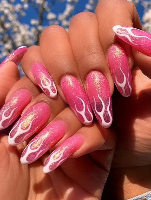 Neon pink long oval jelly nails white flames
