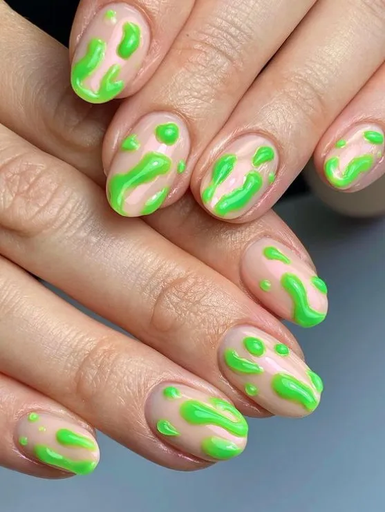 Nude nails with 3D neon green slime