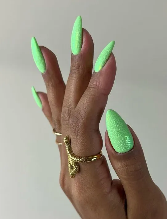Pastel neon green nails with 3D bubble effect