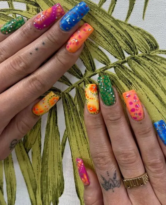Summer long square nails with mismatched bloom designs and gems